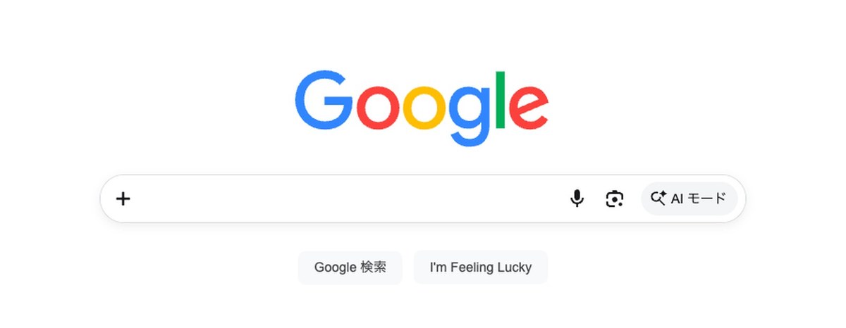 Googleのトップページの画面。中央のGoogleのロゴの下に検索バーがあり、左端に＋、右側にマイクとカメラのアイコン、右端に「AI モード」と書かれたボタンが並んでいる