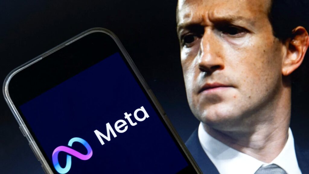 スマートフォン画面に表示されたMetaのロゴとアプリ名、背景に険しい表情の男性の写真。Meta、商用規約のAI学習の文言を外した 日本語版は10月18日も残る