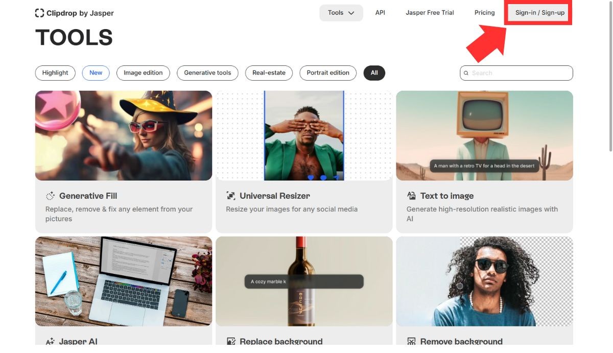 ClipdropのTOOLS画面で右上の「Sign-in / Sign-up」のボタンを赤枠で囲み、赤い矢印で示した画面