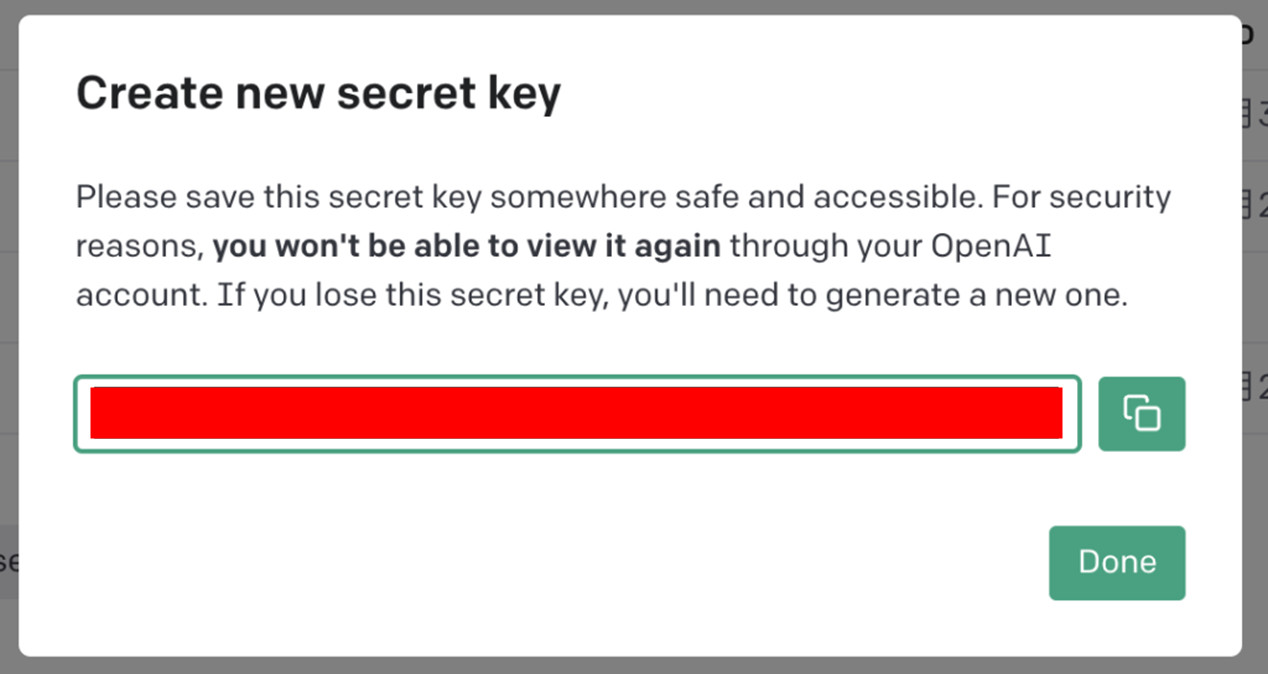 OpenAIの「Create new secret key」のダイアログで、作成したキーの文字列を赤く塗りつぶして隠した画面