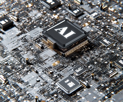 「AI」と書かれた半導体チップが基板の上に置かれ、まわりに小さなチップが並んだイメージ画像
